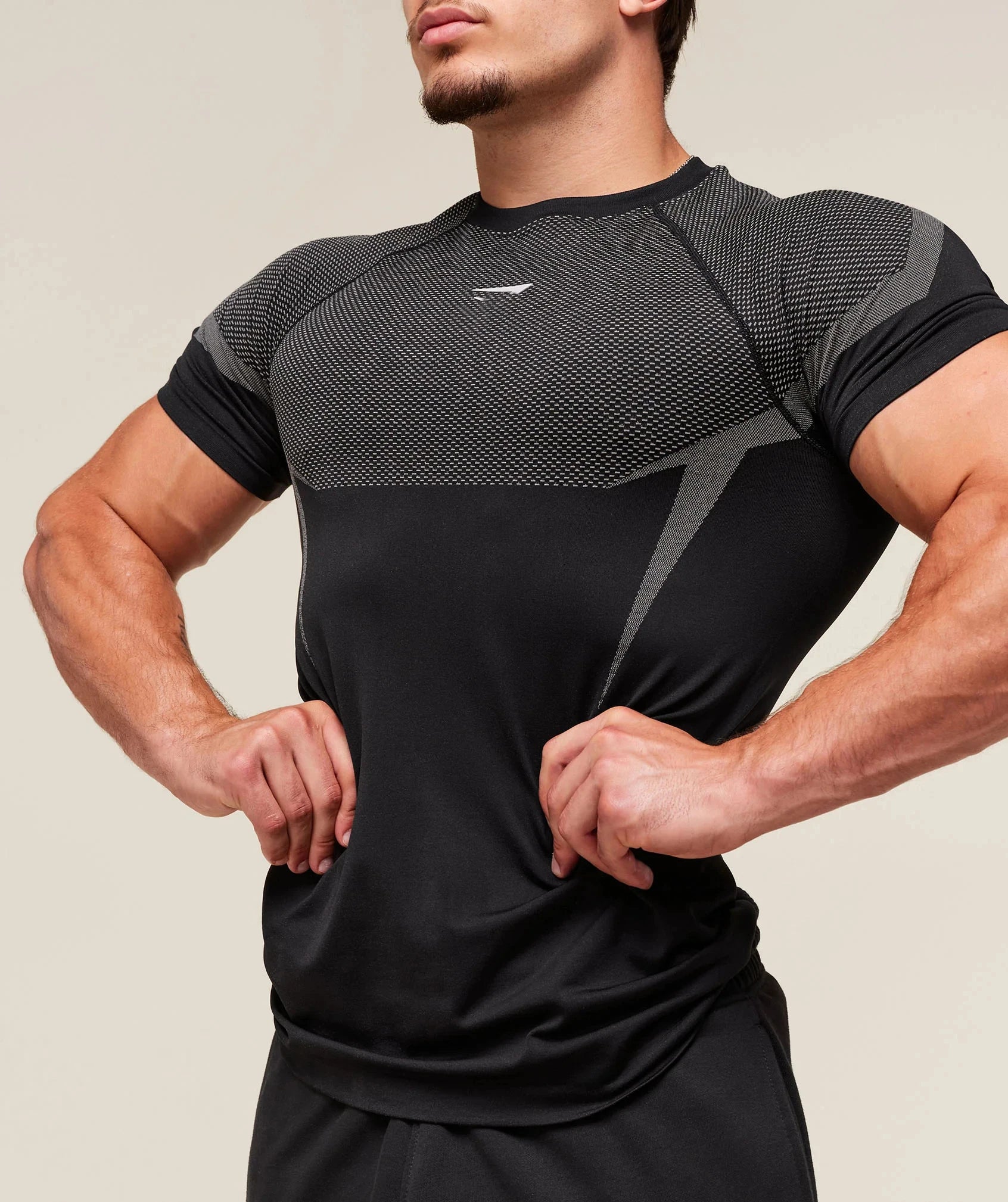 "Camiseta deportiva masculina transpirable de manga corta para ejercicio y running"